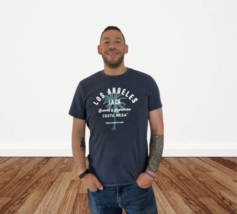 Zak, an experienced Architectural Technologist at ZIC Architecture, standing in a casual pose against a neutral background.